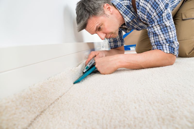 Professional Carpet Installer at Work